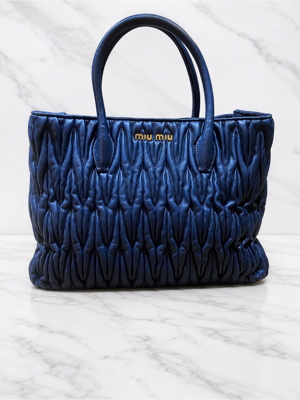 Miu Miu Bluette blue color  Matelassé Top-Handle Tote